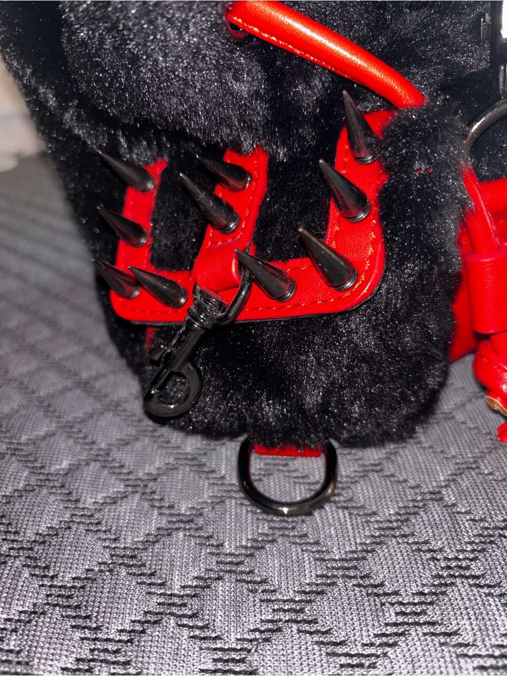 Dolls Kill current mood Faux Fur Backpack with Red Patent Trim and Spike Accents - Picture 2 of 7
